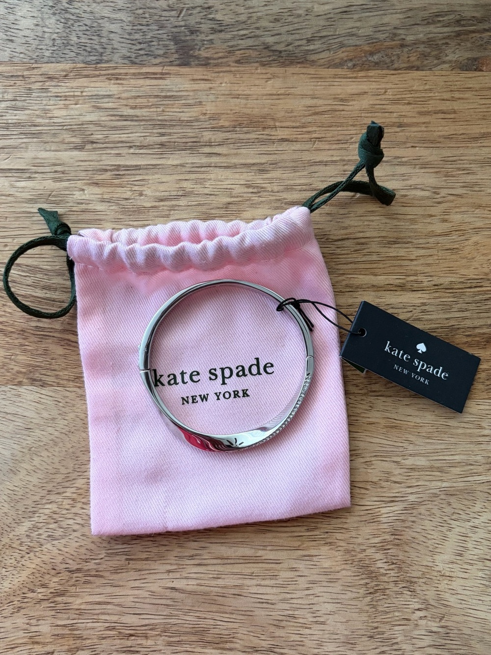 kate spade Silver Bangle with Pink Drawstring Pouch